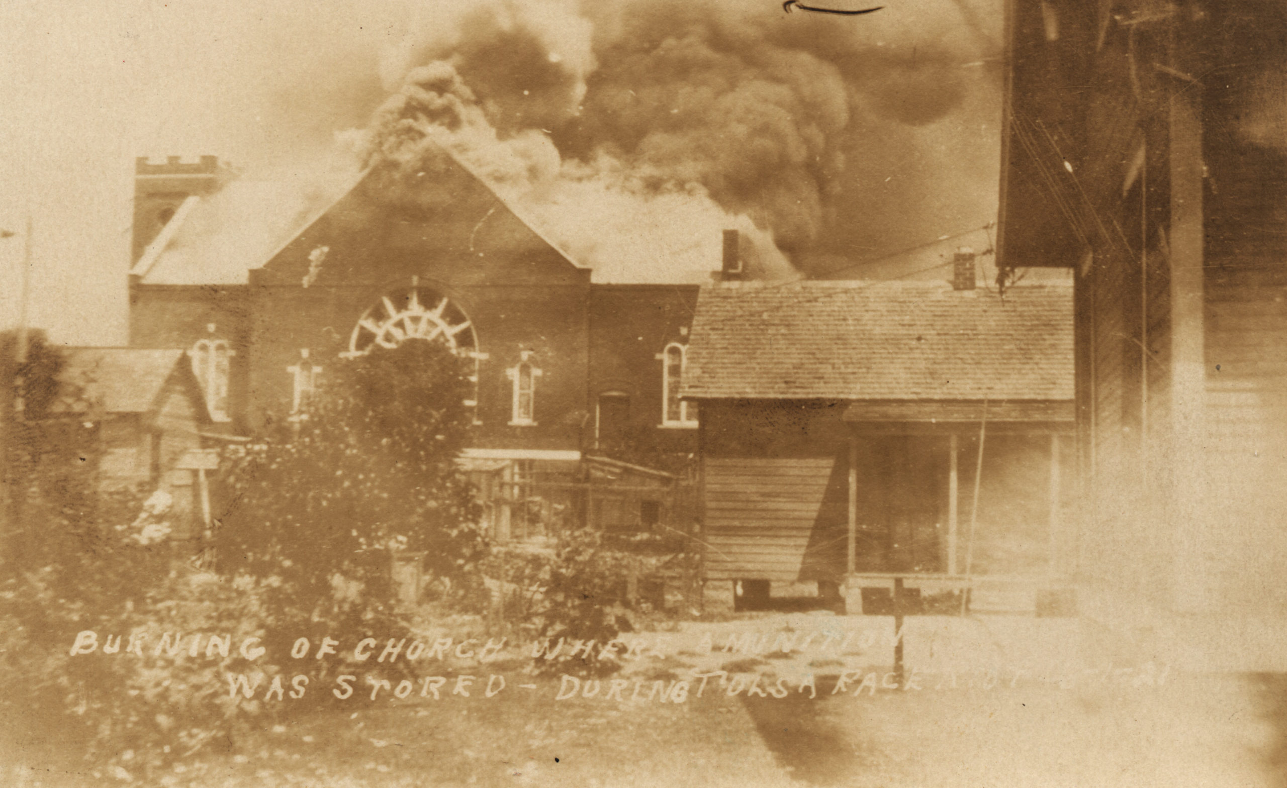 Mt. Zion Baptist Church is burning in this picture taken about Cameron St. and Elgin Ave. The Church was rumored at the time to have been a storehouse for weapons and ammunition. Title is taken from the writing on the face of the postcard.